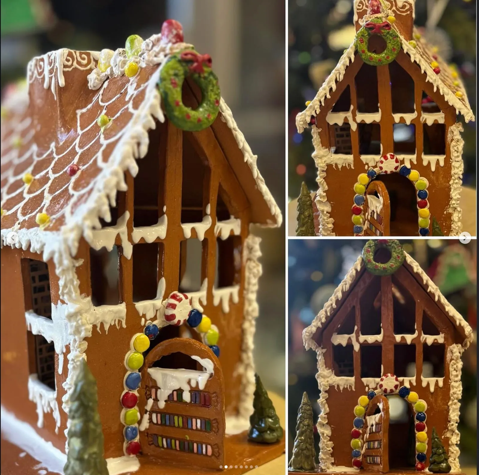 Ceramic gingerbread house with snow-white icing, candy details, and a wreath.