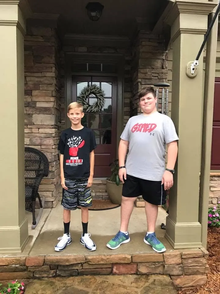 Cole Fox standing on a front porch.